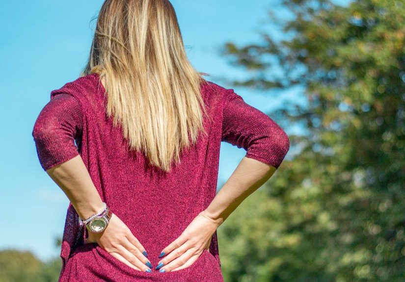 Lower Back Pain Causes in Females: Symptoms, Treatments, More